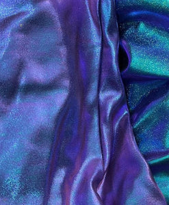 a close up of a purple and blue fabric